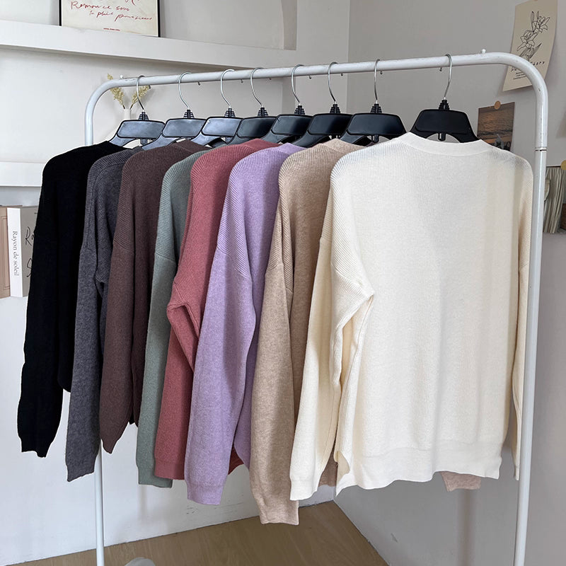 Puha, egyszínű, gyengéd, sokoldalú, V-nyakú, bő, hosszú ujjú kardigán, női kötöttáru